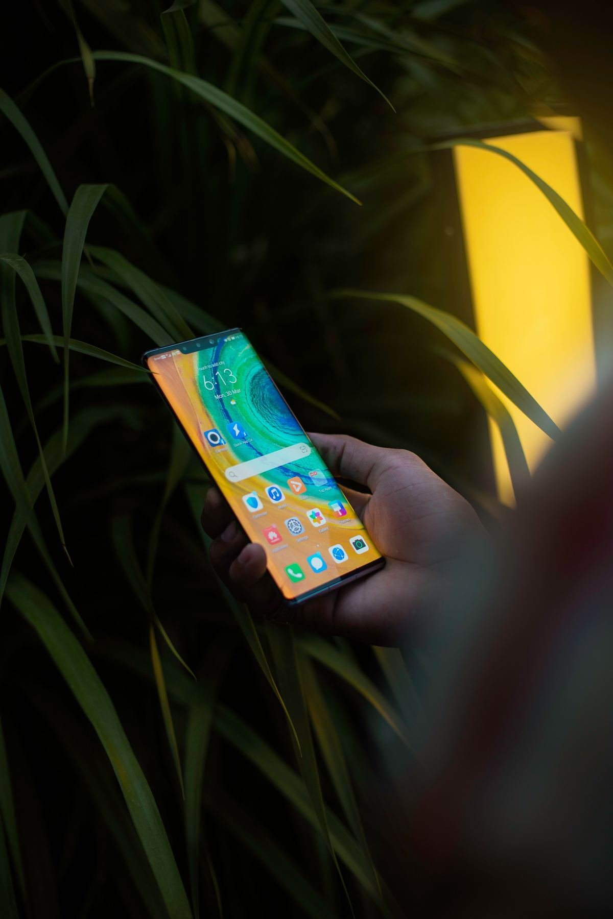 Smartphone glowing in neon light